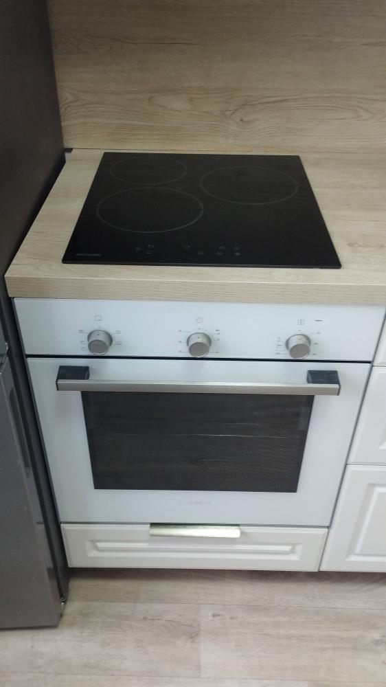 Сборка и установка кухонного каркаса с заказными фасадами Еврозапил столешницы из ДСП Установка столешницы ДСП