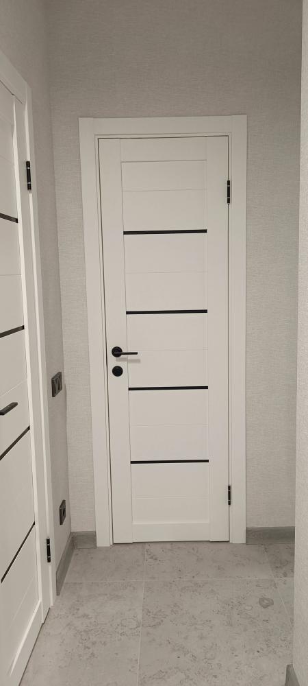 Установка межкомнатной двухстворчатой двери