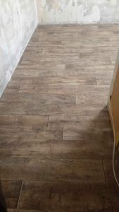 Укладка линолеума на клей более 15 кв.м