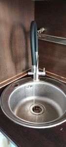 Установка проточного фильтра под мойку