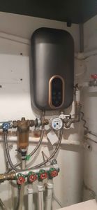 Установка электрического проточного водонагревателя