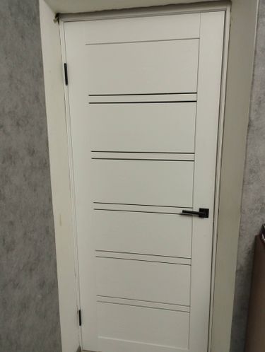 Установка межкомнатной двухстворчатой двери