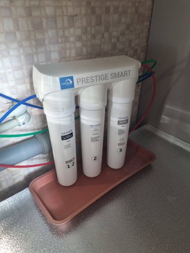 Замена картриджа в системе фильтрации