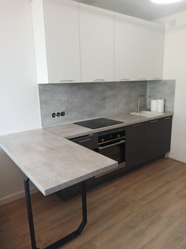 Установка и подключение электрической варочной поверхности Установка стеновой панели МДФ/ДСП Установка барной стойки-столешницы