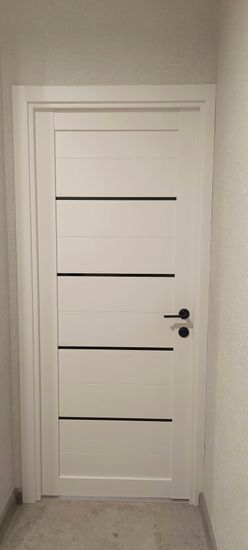 Установка межкомнатной двухстворчатой двери