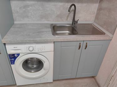 Установка и подключение встраиваемой стиральной машины