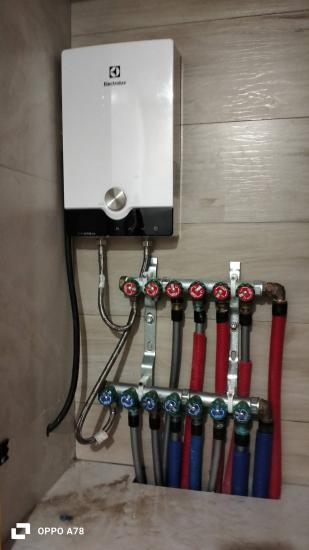 Установка электрического проточного водонагревателя