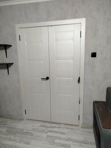 Установка межкомнатной двухстворчатой двери