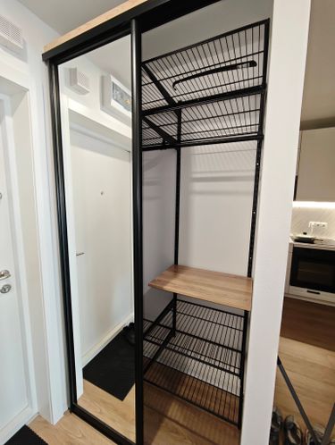 Разборка сетчатой гардеробной системы