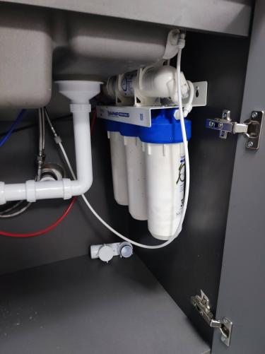 Замена картриджа в системе фильтрации