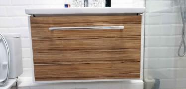 Заменены петли, укреплены крепления, отрегулирована дверца, обновлена ручка, устранены сколы, восстановлено покрытие, проверена устойчивость, улучшена функциональность.