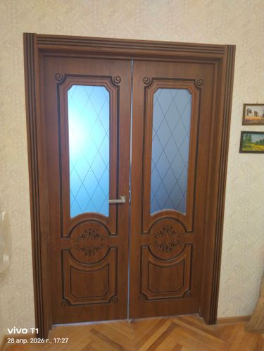 Установка межкомнатной двухстворчатой двери