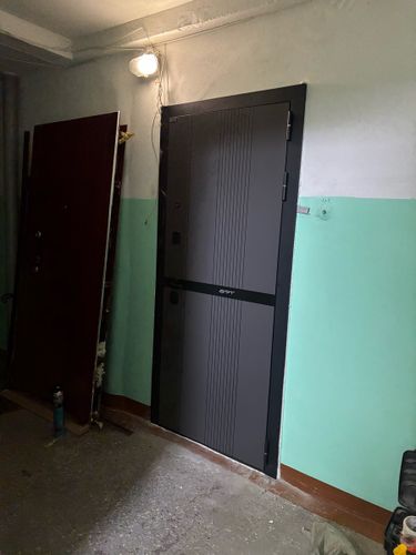 Демонтаж металлической двери с сохранением дверного  блока