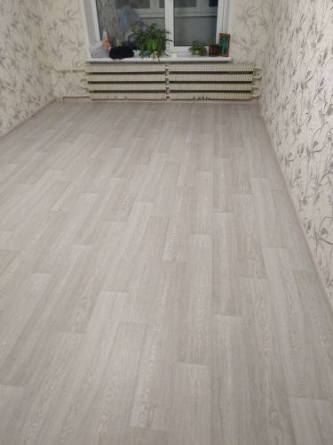 Укладка линолеума на клей более 15 кв.м