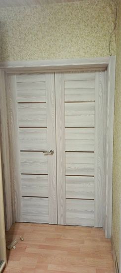 Установка межкомнатной двухстворчатой двери