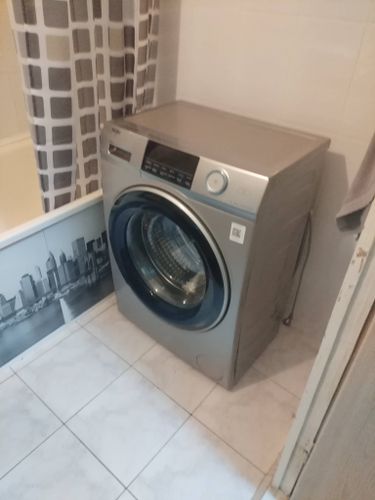 Установка и подключение встраиваемой стиральной машины