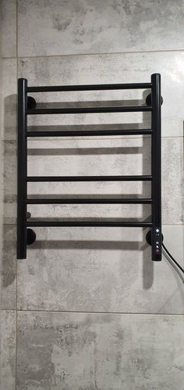 Закреплен прибор на стене, подключен к электросети, проверена работа, обеспечена безопасность, выполнено тестирование, завершена настройка, обеспечена надежность, достигнута функциональность.