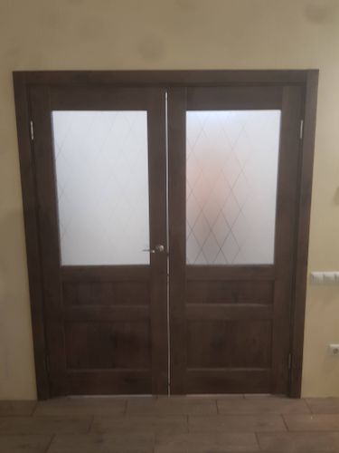 Установка межкомнатной двухстворчатой двери