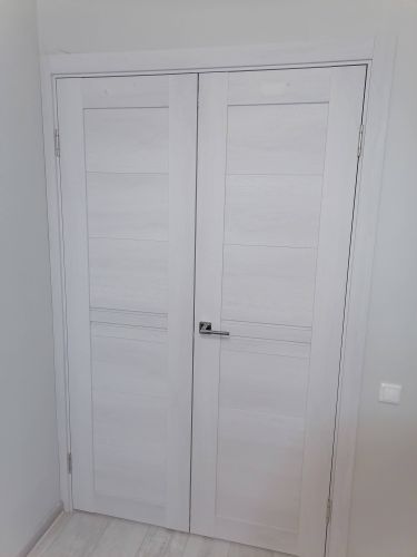 Установка межкомнатной двухстворчатой двери