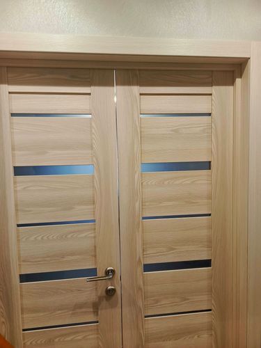 Установка межкомнатной двухстворчатой двери