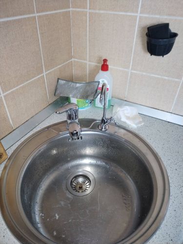 Установка проточного фильтра под мойку