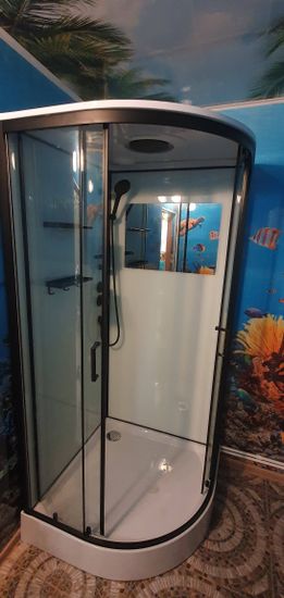 Установлена современная душевая конструкция с гидромассажем. Подключены все коммуникации, герметично закреплены стенки, смонтированы двери, проверена функциональность системы.