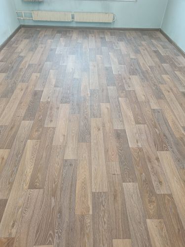 Укладка линолеума на клей более 15 кв.м