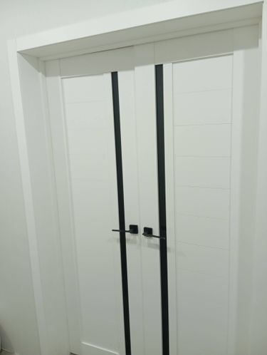 Установка межкомнатной двухстворчатой двери