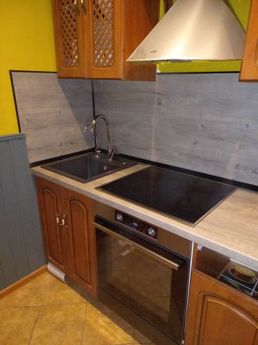 Установка и подключение крана и фильтра для питьевой воды Демонтаж столешницы из ДСП без сохранения Прямой распил фальшпанели/фасада/полки