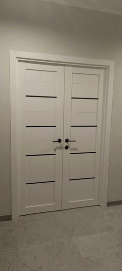 Установка межкомнатной двухстворчатой двери