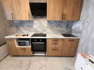 Установка и подключение встраиваемого электрического духового шкафа Установка и подключение электрической варочной поверхности Сборка и установка кухонного каркаса с заказными фасадами