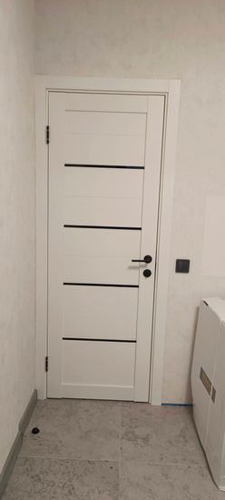 Установка межкомнатной двухстворчатой двери