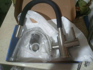 Установка проточного фильтра под мойку