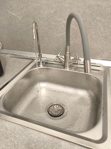 Установка проточного фильтра под мойку