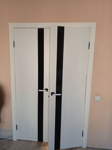 Установка межкомнатной двухстворчатой двери