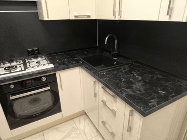 Установка столешницы ДСП Установка и подключение врезной мойки Выезд мастера за пределы зоны бесплатного выезда