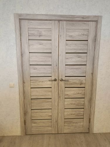 Установка межкомнатной двухстворчатой двери