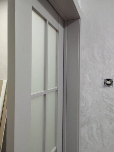 Установка межкомнатной двухстворчатой двери