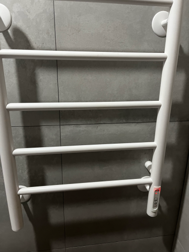 Закреплен электрический прибор на стене, подключен к сети, проверена работа, обеспечена безопасность и надежность крепления, выполнено тестирование функциональности устройства.