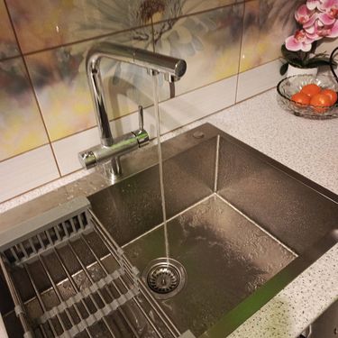 Установка проточного фильтра под мойку