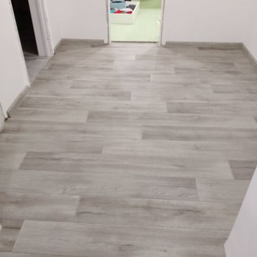 Укладка линолеума на клей более 15 кв.м