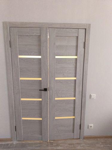 Установка межкомнатной двухстворчатой двери