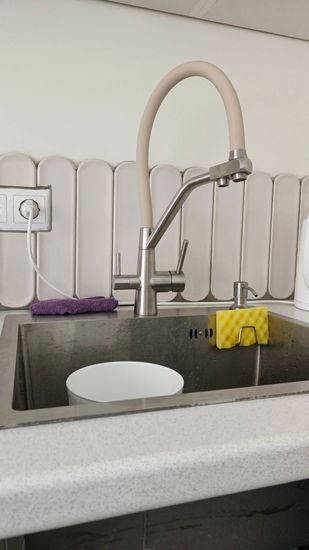 Установка проточного фильтра под мойку