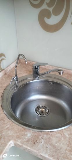 Установка проточного фильтра под мойку