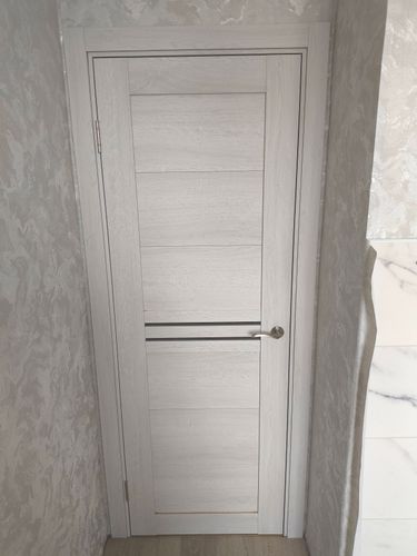 Установка межкомнатной двухстворчатой двери