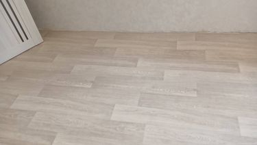 Укладка линолеума на клей более 15 кв.м