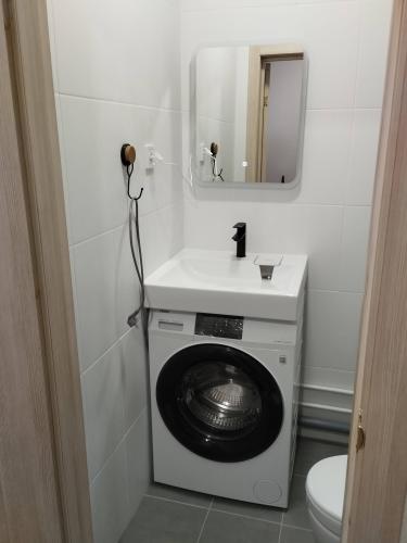 Установка отдельностоящей стиральной машины с подключением