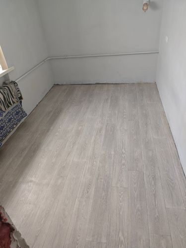 Укладка линолеума на клей более 15 кв.м