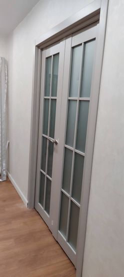 Установка межкомнатной двухстворчатой двери