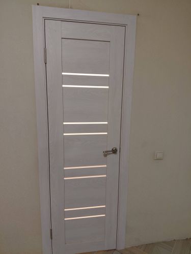 Установка межкомнатной двухстворчатой двери